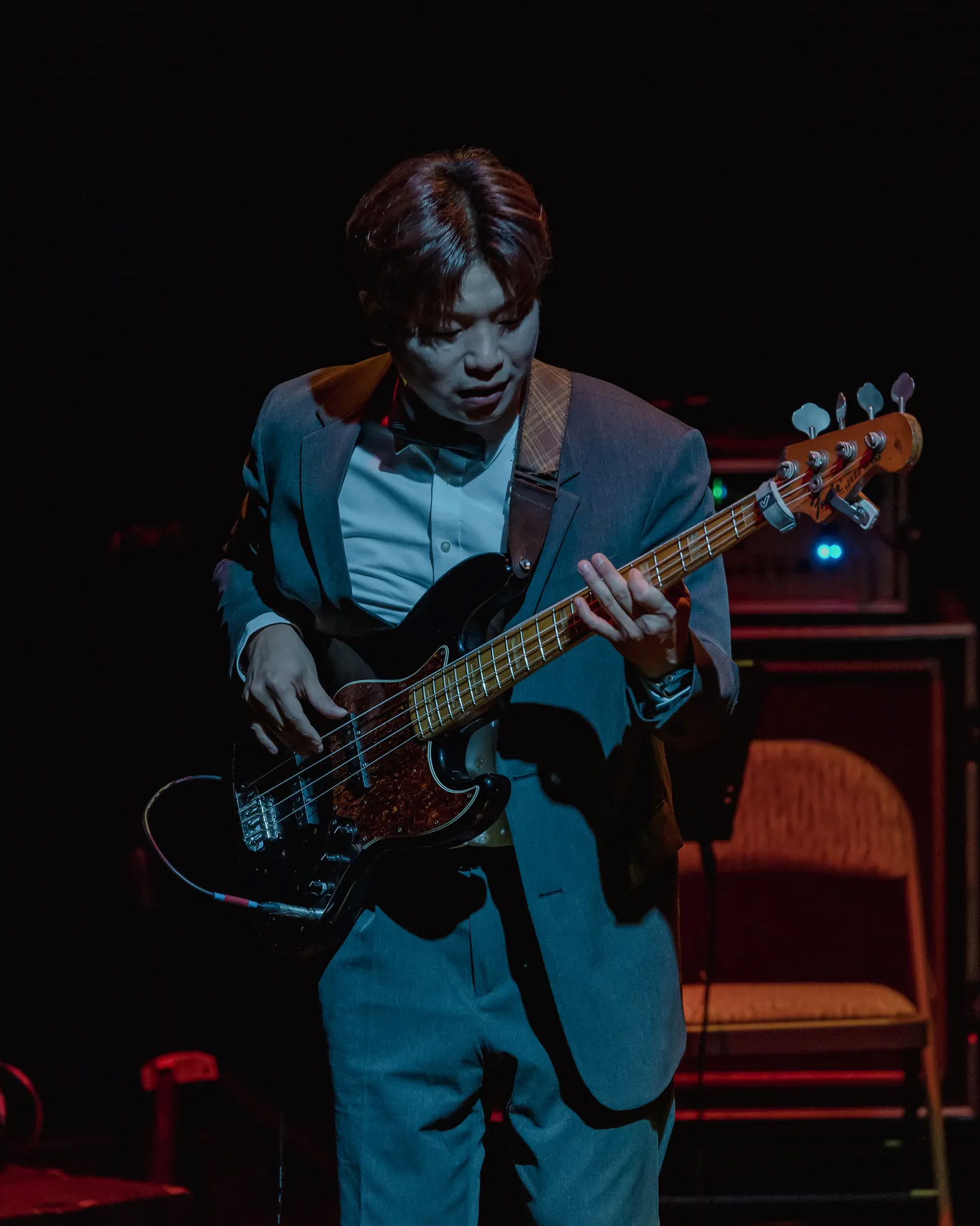 Man playing bass guitar.