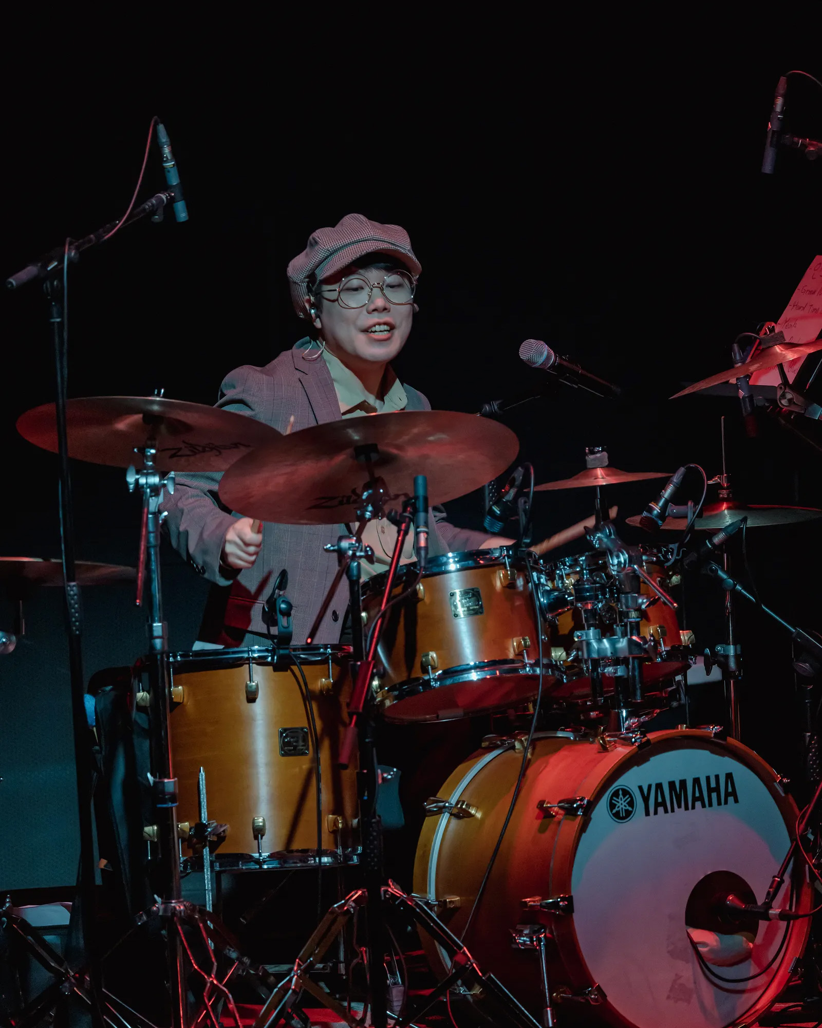 Man playing drums.